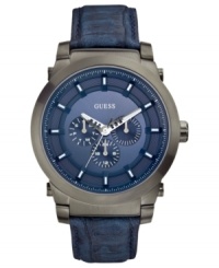 A sporty design gets upgraded with rich, blue-colored leather on this GUESS watch.