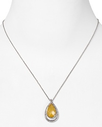 Make a sparkly statement with this canary-yellow pendant from Lora Paolo. Wear it to enliven a basic neckline or slip it over something silky to fancy-up your favorite frock. Make a sparkly statement with this canary-yellow pendant from Lora Paolo. Wear it to enliven a basic neckline or slip it over something silky to fancy-up your favorite frock.