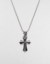 A rayskin-textured cross, crafted in sterling silver with contrasting onyx inlay. Sterling silver Onyx Pendant, about 2 long Necklace, about 20 long Imported 
