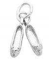 She'll be doing pirouettes. Rembrandt's chic charm features polished ballet shoes crafted from sterling silver. Charm can easily be added to your favorite necklace or charm bracelet. Approximate drop: 3/4 inch.