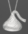 Accessorize with the sweetest sparkle. This 3-D Hershey's Kiss pendant is crafted in sterling silver with diamond accents. Approximate length: 16 inches + 2-inch extender. Approximate drop: 3/4 inch.