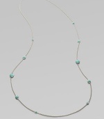 From the Silver Wonderland Collection. A long, lovely sterling silver chain is brightly dotted with faceted turquoise in an array of sizes. Turquoise Sterling silver Length, about 38 Lobster clasp Imported