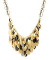 Cascading leaves in two-tone metallics look good whatever the season! Kenneth Cole New York's shimmery cluster necklace features leaf-shaped charms in gold and hematite-plated mixed metal. Approximate length: 17 inches +3-inch extender. Approximate drop: 2 inches.