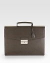 Saffiano leather double-gusset briefcase. Top handle Front push-lock closure with key lock Leather 14½W X 11H X 2½D Made in Italy 
