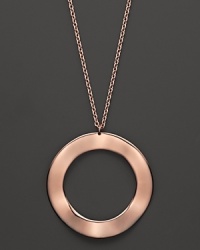 An elegant rose silver circular pendant on a fine chain from Ippolita. An elegant rose silver circular pendant on a fine chain from Ippolita.