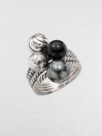 From the Elements Collection. Faceted hematite, smooth black onyx beads and multi-textural sterling silver beads in a clustered design on a sterling silver setting. Black onyx and hematiteSterling silverImported From the Elements Collection. Faceted hematite, smooth black onyx beads and multi-textural sterling silver beads in a clustered design on a sterling silver setting. Black onyx and hematiteSterling silverImported