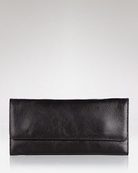 Hobo's luxe leather wallet is a smooth cash stasher with an smartphone pocket to boot. The cool compact keeps your essentials close, in your day bag or as a cocktail-ready clutch. Hobo's luxe leather wallet is a smooth cash stasher with an smartphone pocket to boot. The cool compact keeps your essentials close, in your day bag or as a cocktail-ready clutch.
