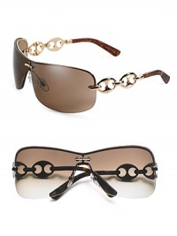 Rimless three-piece mount with marina chain temple. Available in gold frames with brown lens and chocolate frames with gray lens. Metal Made in Italy Rimless three-piece mount with marina chain temple. Available in gold frames with brown lens and chocolate frames with gray lens. Metal Made in Italy