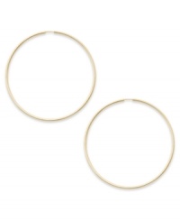 Forever stylish, forever chic. This pair of endless hoop earrings comes in 14k gold. Approximate diameter: 45 mm. Forever stylish, forever chic. This pair of endless hoop earrings comes in 14k gold. Approximate diameter: 45 mm.