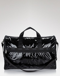 A sleek weekender bag in dazzling nylon from LeSportsac. A sleek weekender bag in dazzling nylon from LeSportsac.