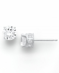 Diamond stud earrings have never sparkled so bright. This unique style features a round-cut diamond at center with a row of round-cut diamonds in the post (1-1/2 ct. t.w.). Four-prong setting crafted in 14k white gold. Approximate diameter: 4-2/5 mm. Diamond stud earrings have never sparkled so bright. This unique style features a round-cut diamond at center with a row of round-cut diamonds in the post (1-1/2 ct. t.w.). Four-prong setting crafted in 14k white gold. Approximate diameter: 4-2/5 mm.