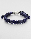 From the Spirited Bead Collection, this two-row beaded bracelet is handsomely crafted from 6mm lapis beads with an adjustable sterling silver beaded clasp.Sterling silverLapisAbout 9 longAbout 3 diam.Imported