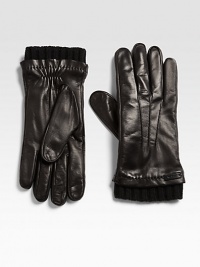A cold weather favorite, shaped in rich Italian leather with a cashmere lining and a ribbed-knit trim.About 10 longCashmere linedLeatherDry cleanMade in Italy A cold weather favorite, shaped in rich Italian leather with a cashmere lining and a ribbed-knit trim.About 10 longCashmere linedLeatherDry cleanMade in Italy