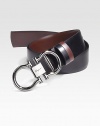Smooth Italian leather with signature buckle. Gunmetal double gancini closure About 1½ wide Made in Italy