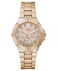Up your glam factor with the crystals and rosy hues found on this GUESS watch. Up your glam factor with the crystals and rosy hues found on this GUESS watch.