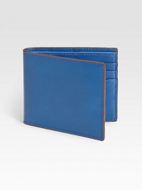 Classic bill holder of treated mill leather and contrasting trim for a contemporary touch.One billfold compartmentSix card slotsLeather4W x 4HImported