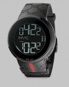 From the I-Gucci Collection. For jet setters and net surfers, a smart, sporty timepiece that lets you track two time zones at once, displaying them with digital grace. Swiss digital movement 44mm black PVD case Black embossed logo strap with signature color band Black dial with digital display, including date Water-resistant to 3ATM Imported