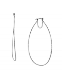 Take your look to the next level with bold, yet versatile, hoop earrings. This dramatic BCBGeneration style shimmers in silver tone mixed metal. Approximate diameter: 3 inches. Take your look to the next level with bold, yet versatile, hoop earrings. This dramatic BCBGeneration style shimmers in silver tone mixed metal. Approximate diameter: 3 inches.