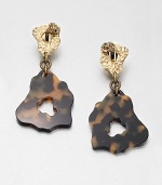 This beautiful abstract design features a subtle leopard spot print. BrassAcetateLength, about 2.36Clip-on backMade in Italy and imported