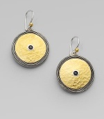From the Shield Collection. A sleek design with 24k gold and a center spinel set in dark and white sterling silver. Dark and white sterling silver24k goldBlack spinelLength, about ¾Hook backImported 