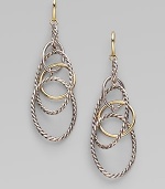 A coming together of the cabled and the smooth, the oval and the circle, sterling silver and 18k gold, in a delicate linked design that dangles with mobile grace. 18k yellow gold and sterling silver Drop, about 2½ Ear wire Made in Italy