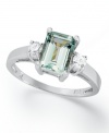 A touch of shine. This stunning ring features a rectangular-cut aquamarine (1-5/8 ct. t.w.) and sparkling diamond side stones (1/6 ct. t.w.). Crafted in 14k white gold.