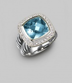 From the Albion Collection. A classic Yurman design, offering a faceted blue topaz, framed in diamonds, on a split cable band of sterling silver. Diamonds, 0.24 tcw Blue topaz Sterling silver About ½ square Imported