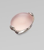 An elegant design with large rose quartz stone accented on the side with pink tourmaline, all set in sterling silver.Rose quartz, pink tourmalineSterling silverWidth, about 1Imported