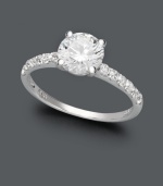 A hint of sparkle and traditional style make an effortless statement. This exquisite piece by Arabella features a stunning, round-cut Swarovski zirconia (2-3/4 ct. t.w.) with round-cut Swarovski zirconias at the shoulders. Crafted in 14k white gold.