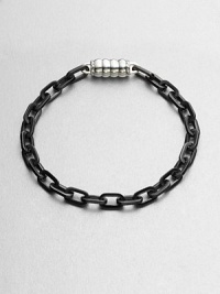 Intricate links of sterling silver and stainless steel offers a remarkably modern contrast to your classic, polished ensemble.Sterling silver/stainless steelAbout 3 diam.Imported Intricate links of sterling silver and stainless steel offers a remarkably modern contrast to your classic, polished ensemble.Sterling silver/stainless steelAbout 3 diam.Imported
