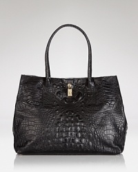 A favorite tote for this season and next, this Furla carryall works the textured trend in croc-embossed leather with an always-in-style shape. A favorite tote for this season and next, this Furla carryall works the textured trend in croc-embossed leather with an always-in-style shape.