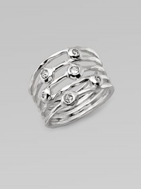 From the Silver Rain Collection. A striking, sculptural design with open strands of polished sterling silver, each one accented by a shimmering diamond.Diamonds, .25 tcw Sterling silverWidth, about ½Imported From the Silver Rain Collection. A striking, sculptural design with open strands of polished sterling silver, each one accented by a shimmering diamond.Diamonds, .25 tcw Sterling silverWidth, about ½Imported