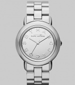 Smart and chic style with a mirror dial for added shine. Quartz movement Water resistant to 5 ATM Round stainless steel case, 36mm (1.4) Silver mirror logo dial Second hand Stainless steel link bracelet, 18mm wide (0.7) Imported 