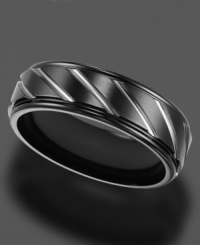 Strong, durable black titanium showcases silver tone etching on this sleek ring by Triton. 7 mm band. Sizes 8-15. Strong, durable black titanium showcases silver tone etching on this sleek ring by Triton. 7 mm band. Sizes 8-15.