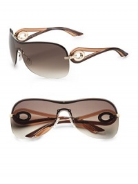 A versatile style with metal inlay arms. Available in gold/brown honey with gray gradient lens. Logo temples 100% UV protection Made in Italy A versatile style with metal inlay arms. Available in gold/brown honey with gray gradient lens. Logo temples 100% UV protection Made in Italy