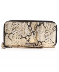An eye-catching design from Kenneth Cole Reaction, featuring a fun python print and sleek metallic accents. An easy-access zip-around closure and convenient wristlet strap add function to this fashion-loving design. An eye-catching design from Kenneth Cole Reaction, featuring a fun python print and sleek metallic accents. An easy-access zip-around closure and convenient wristlet strap add function to this fashion-loving design.