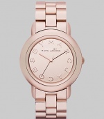Smart and chic style with a mirror dial for added shine. Quartz movement Water resistant to 5 ATM Round rose gold ion-plated stainless steel case, 36mm (1.4) Rose gold mirror logo dial Second hand Rose gold ion-plated stainless steel link bracelet, 18mm wide (0.7) Imported 