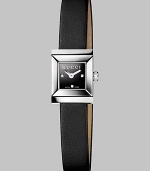 The ultimate day-to-evening design, with a diamond-punctuated bezel, features an elegant satin strap. G-frame stainless steel case, 18mm x 14mm (.70 x .55) Bevel-edged sapphire glass Black lacquered dial set with diamonds Black satin strap Made in Switzerland 