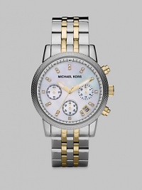 High-contrast appeal and dazzling Swarvoski crystals add interest to this technical timepiece. Quartz movementWater resistant to 10 ATMRound stainless steel case, 36.5mm (1.5) Textured bezelMother-of-pearl chronograph dialSwarvoski crystal hour markersDate display between 4 and 5 o'clockSecond hand Two-tone stainless steel link braceletImported High-contrast appeal and dazzling Swarvoski crystals add interest to this technical timepiece. Quartz movementWater resistant to 10 ATMRound stainless steel case, 36.5mm (1.5) Textured bezelMother-of-pearl chronograph dialSwarvoski crystal hour markersDate display between 4 and 5 o'clockSecond hand Two-tone stainless steel link braceletImported