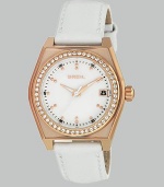 From the Escape Collection. A unique timepiece featuring a warm rose goldtone ion-plated stainless steel contour case with a Swarovski crystal accented round inset case. Quartz movementWater resistant to 10 ATMContour rose goldtone ion-plated stainless steelcase, 34mm (1.3) Swarovski crystal inset bezelWhite dialDot markersDate display at 3 o'clockSecond hand White leather strapImported