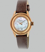 From the Orchestra Collection. A luxurious timepiece in warm rose goldtone ion-plated stainless steel with a dazzling Swarovski crystal markers. Quartz movementWater resistant to 10 ATMRound rose goldtone ion-plated stainless steelcase, 28mm (1.1) Multi-layer bezelMother-of-pearl dialFour Swarovski crystal markersBrown lizard strapImported