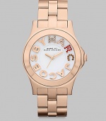Colorful crystals accent the logo dial on this simply chic, stainless steel style. Quartz movementWater resistant to 5 ATMRound rose goldtone ion-plated stainless steel case, 40mm (1.6) Smooth bezelWhite dialCrystal accented and smooth logo hour markersSecond hand Rose goldtone ion-plated stainless steel link braceletImported 