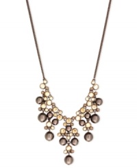 Go for the bold with this frontal drama necklace from Givenchy. Crafted from brown gold-tone mixed metal, the necklace makes a strong fashion statement with gorgeous glass pearl and cubic zirconia accents. Approximate length: 16 inches + 2-inch extender. Go for the bold with this frontal drama necklace from Givenchy. Crafted from brown gold-tone mixed metal, the necklace makes a strong fashion statement with gorgeous glass pearl and cubic zirconia accents. Approximate length: 16 inches + 2-inch extender.