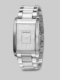 A sleek design with a mastery of the everyday in stainless steel with a curved bracelet. Rectangle bezel Quartz movement Water resistant to 5 ATM Second hand Stainless steel case: 31mm (1.22) Stainless steel bracelet: 23mm (0.90) Deployment clasp Imported A sleek design with a mastery of the everyday in stainless steel with a curved bracelet. Rectangle bezel Quartz movement Water resistant to 5 ATM Second hand Stainless steel case: 31mm (1.22) Stainless steel bracelet: 23mm (0.90) Deployment clasp Imported