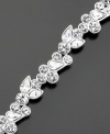 A sparkling crystal vine, silvertone design delivers old-world glamour for the modern woman. Length measures 7-1/4 inches.