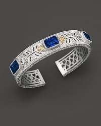 Sterling silver cuff set with faceted white sapphires and corundum. By Judith Ripka. Sterling silver cuff set with faceted white sapphires and corundum. By Judith Ripka.