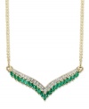 Enhance the glamour of an elegant v-neck gown. This v-shaped pendant necklace is adorned by marquise-cut emeralds (1-1/2 ct. t.w.) and a seamless row of round-cut diamonds (1/7 ct. t.w.). Crafted in 14k gold. Approximate length: 18 inches. Approximate drop length: 1 inch. Approximate drop width: 2-7/8 inches.