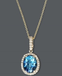 Royalty-inspired and aesthetically appealing. Effy Collection's breathtaking pendant combines an oval-cut blue topaz (2-1/4 ct. t.w.), round-cut diamonds (1/8 ct. t.w.) and a 14k gold setting and chain. Approximate length: 16 inches. Approximate drop: 3/4 inch.