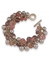Cherry jubilee. Glass pearls are adorned by glittering charms and genuine cherry quartz beads on this cluster bracelet from Carolee. Crafted in imitation rhodium-plated mixed metal with a toggle closure. Approximate length: 8 inches.