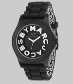 A sporty timepiece with logo details and silicone strap.Quartz movement Water resistant to 3 ATM Round stainless steel case, 40mm, (1.57) Black dial Logo hour markers along outer concave ring Second hand Silicone strap with interior jumbled logo print, 20mm, (.78) Buckle closure Imported 